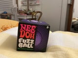 Unopened Needoh purple fuzz ball