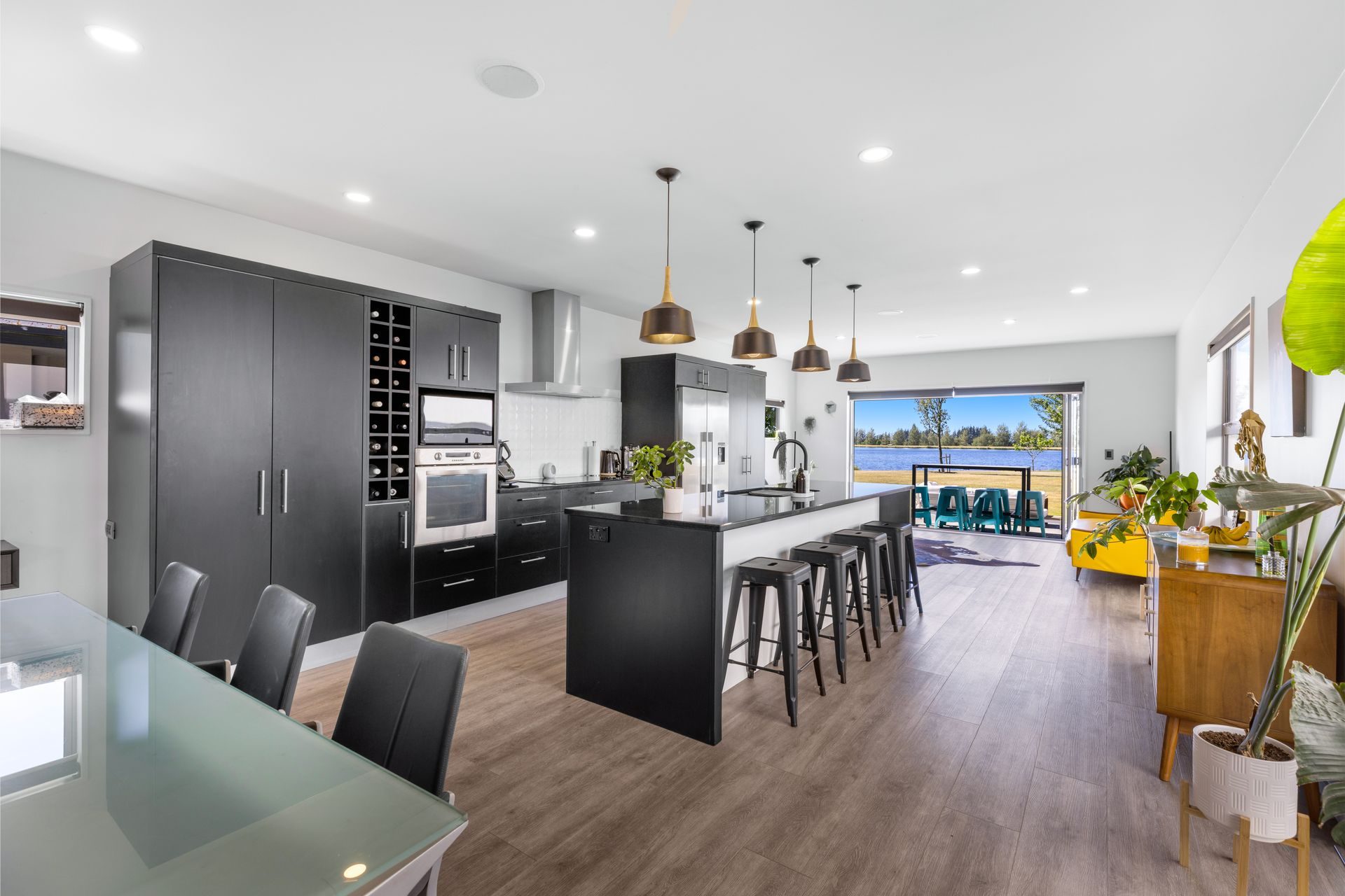 A Statement Lakefront Home — slide 2