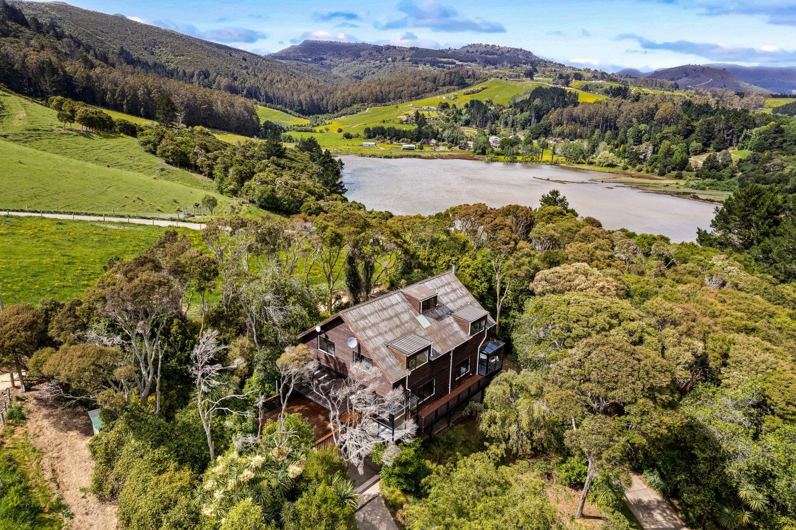 Sunny 4-Bedroom Treetop Home - Still Available! — slide 2