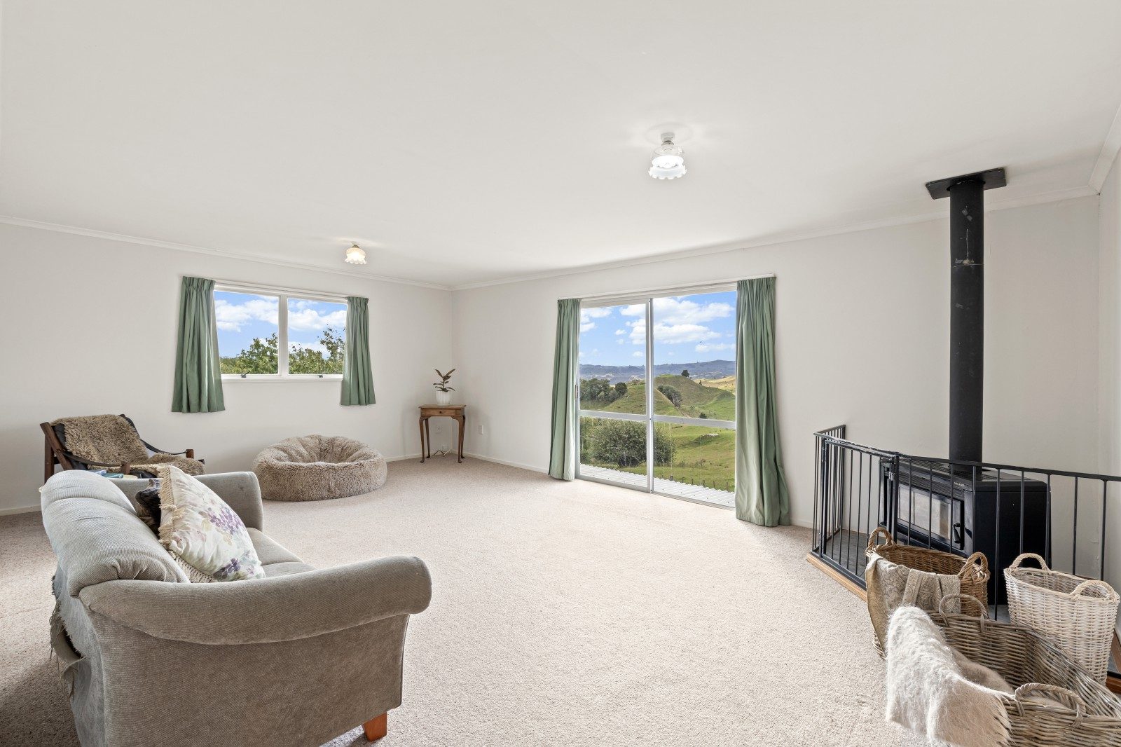 Three bedrooms, deck, views, and shedding on 2.2ha — slide 2