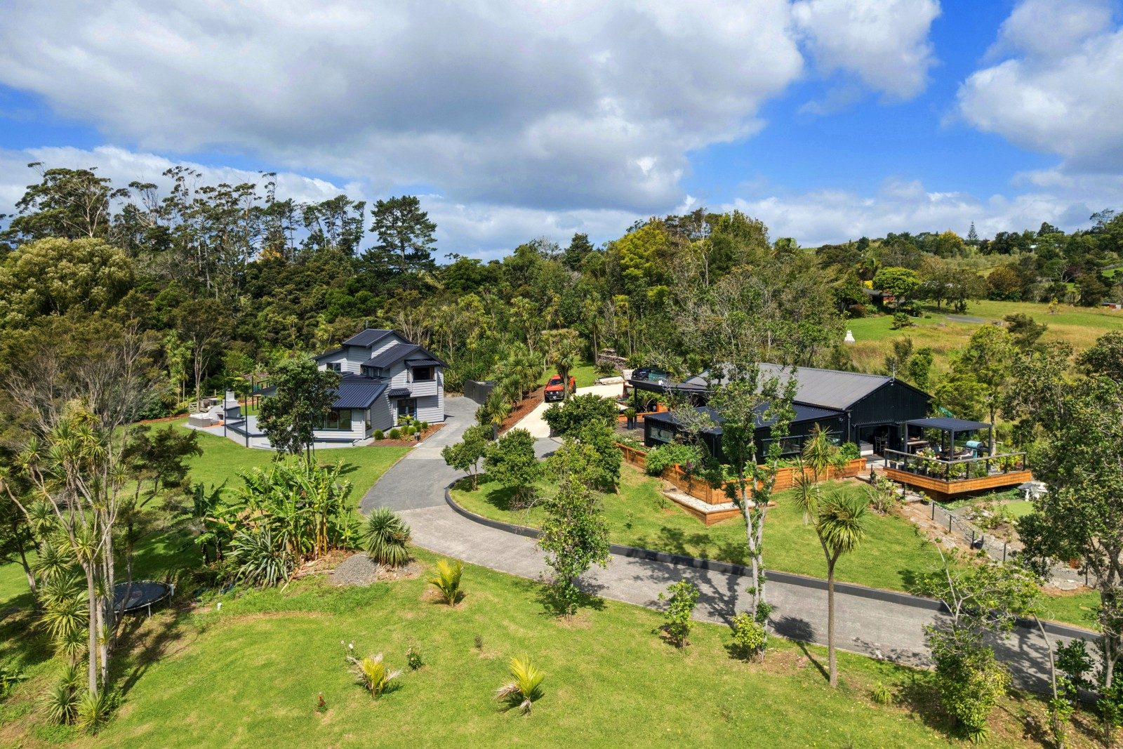 Contemporary luxury on lush park-like grounds — slide 2