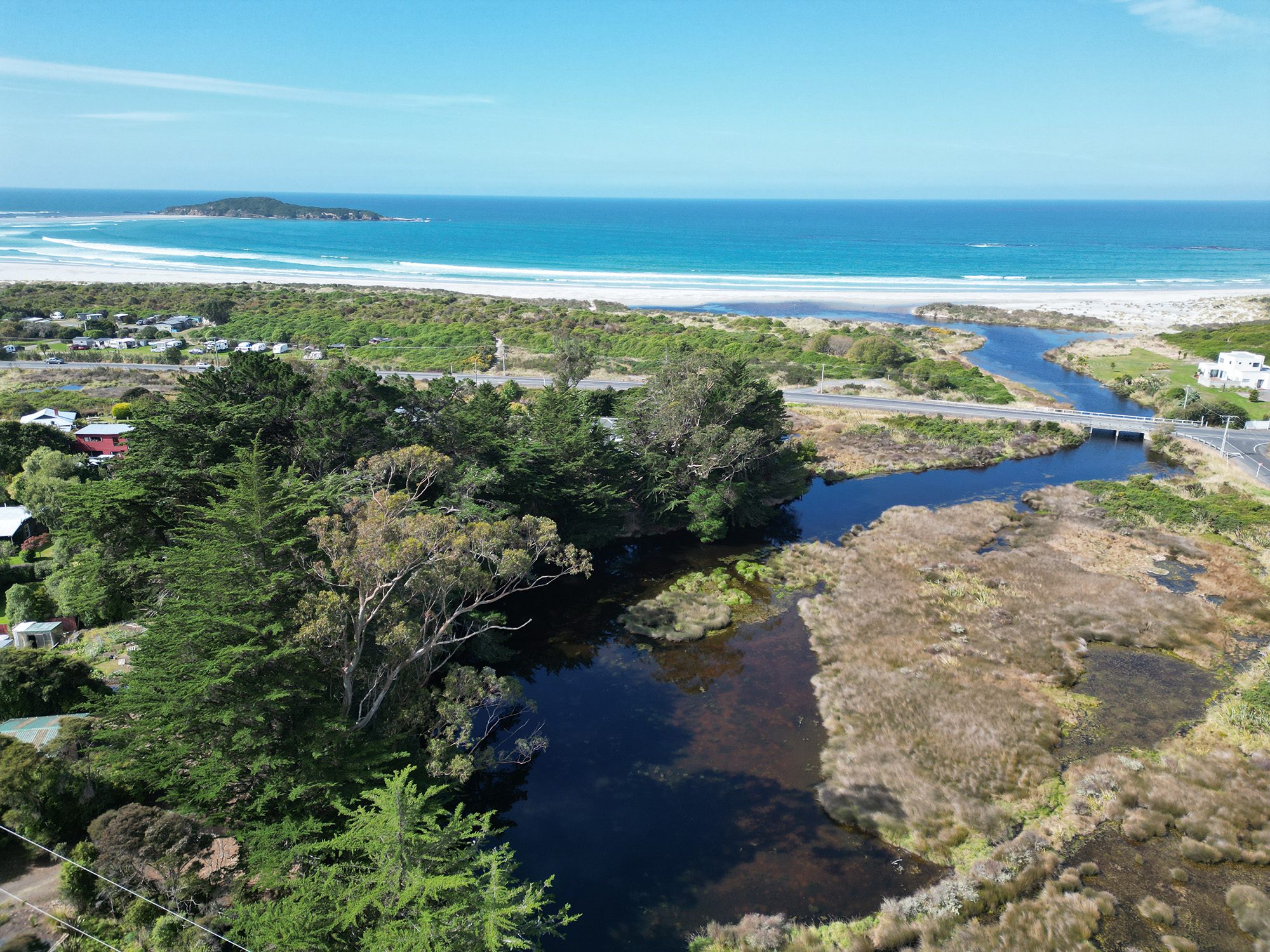 Peaceful coastal section in Taieri Mouth — slide 10