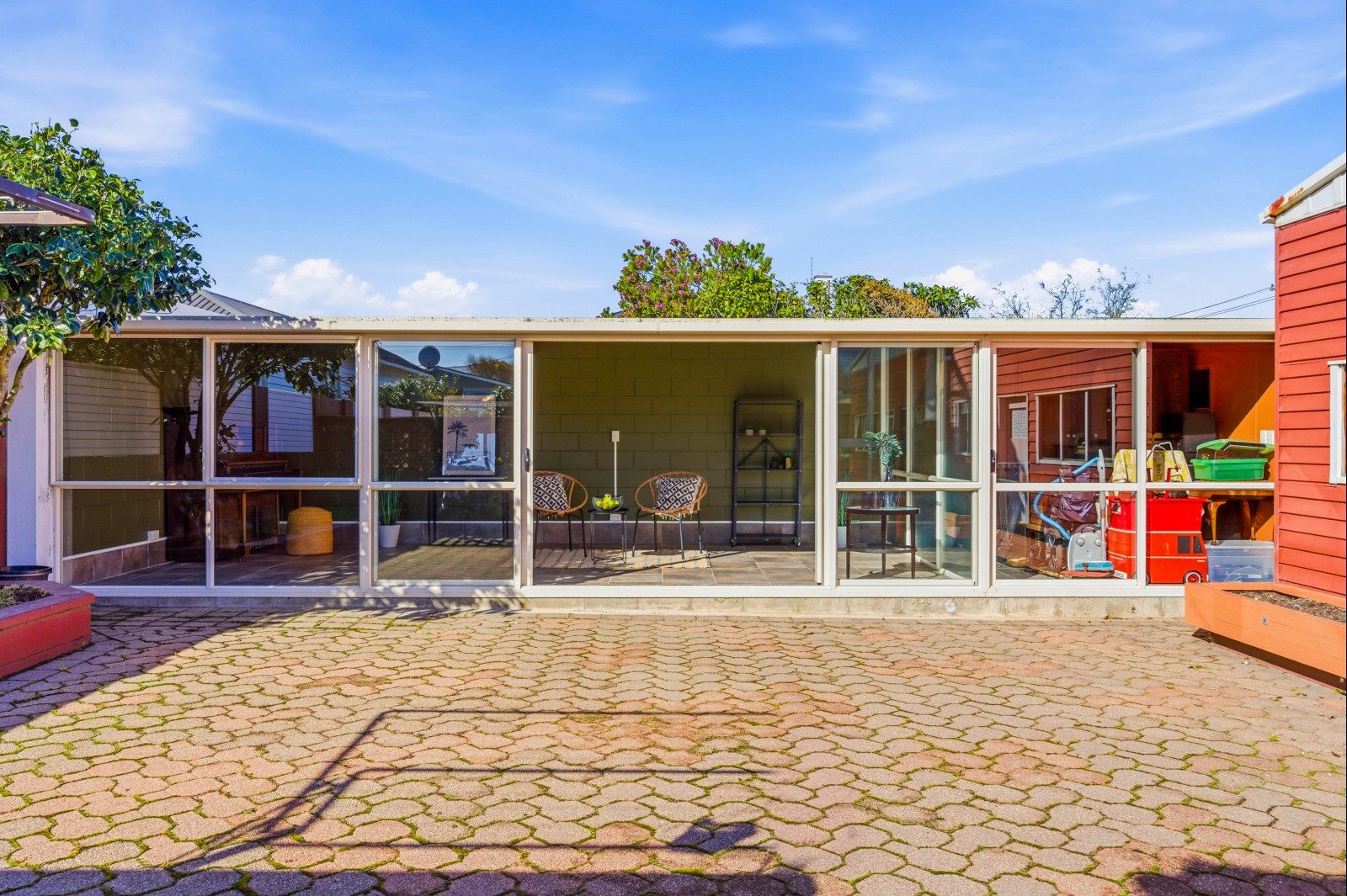 Three car garaging, plus large recreation room — slide 31