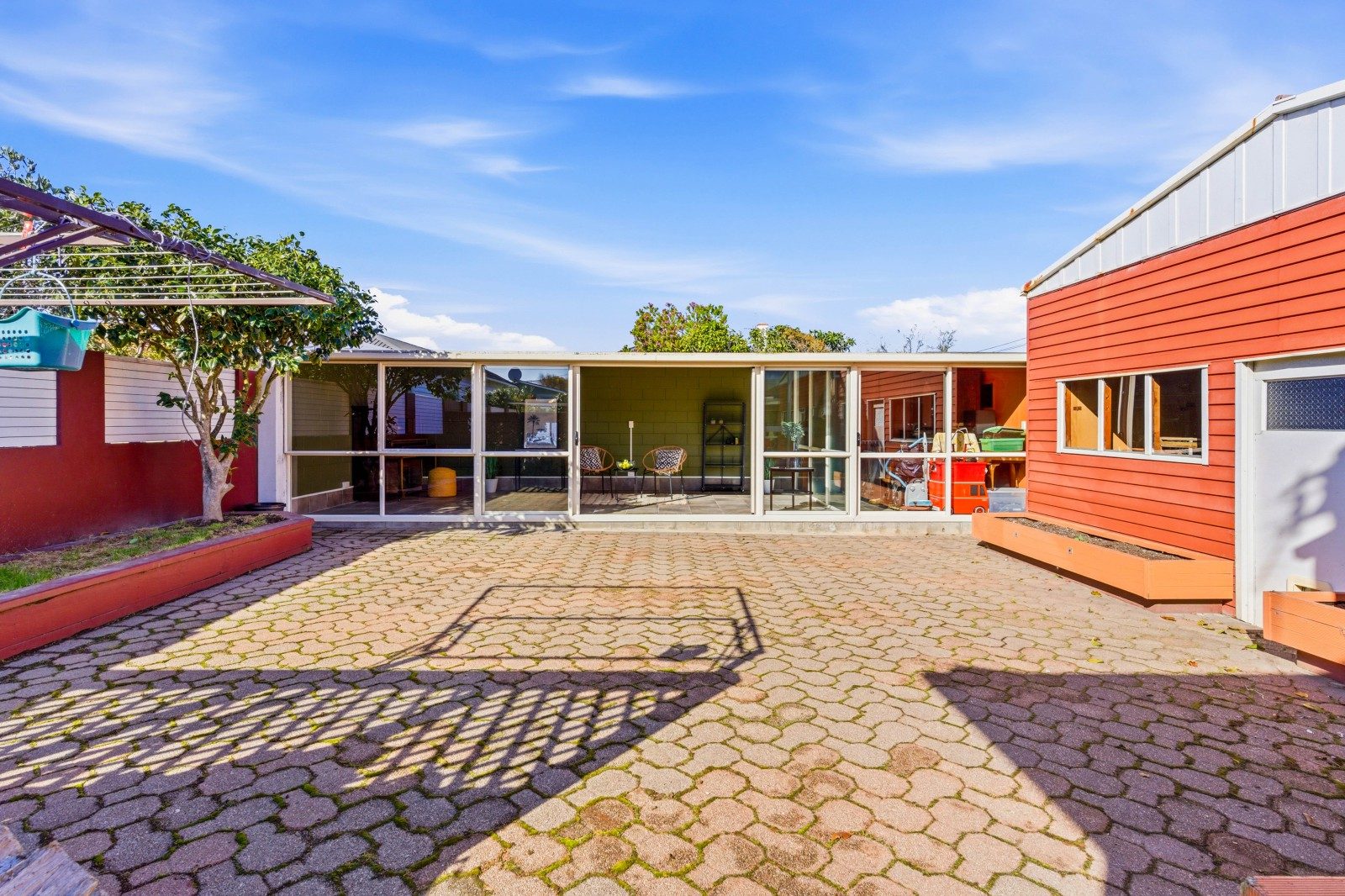 Three car garaging, plus large recreation room — slide 1