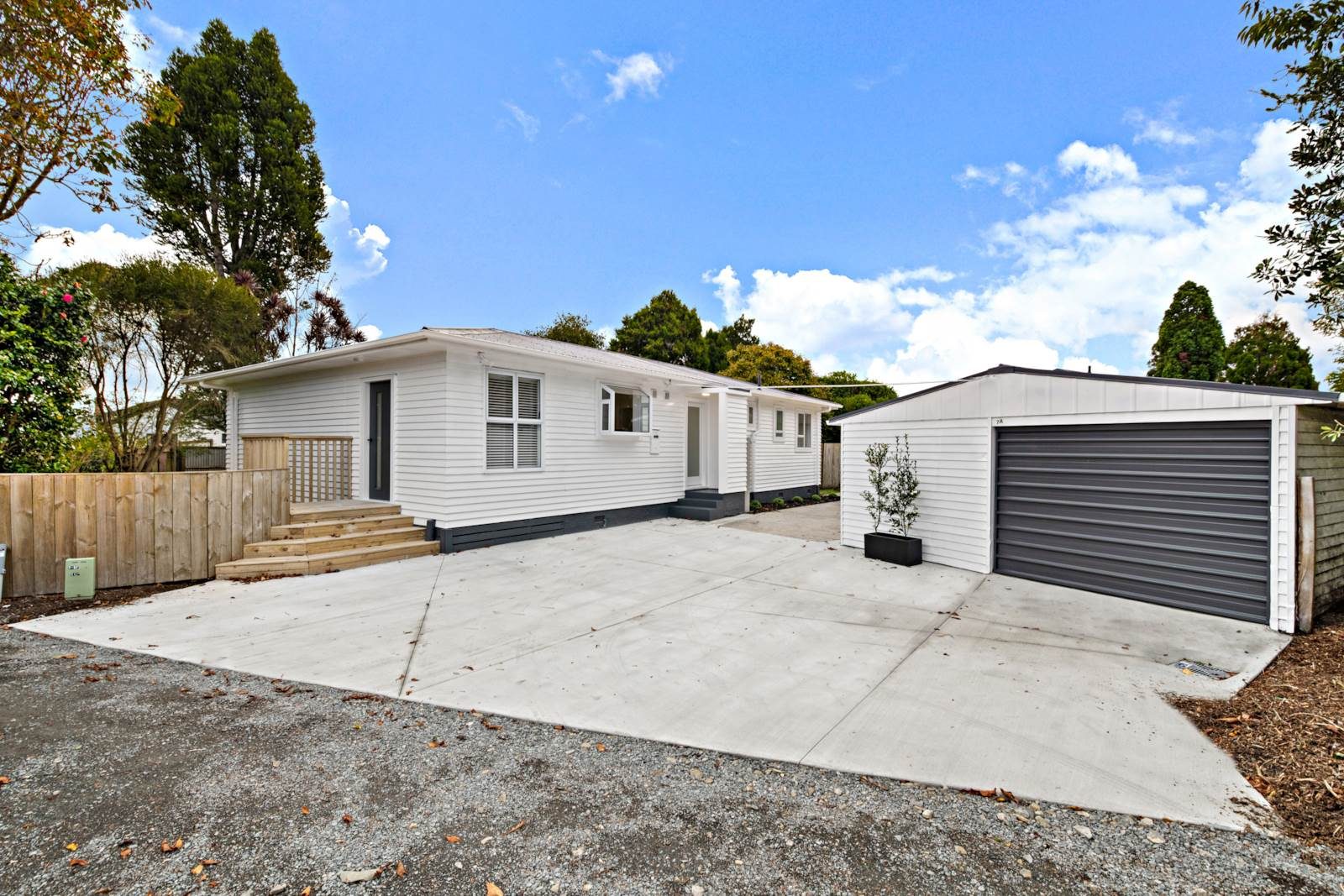 Two dwellings on 1,227m² of freehold land — slide 2