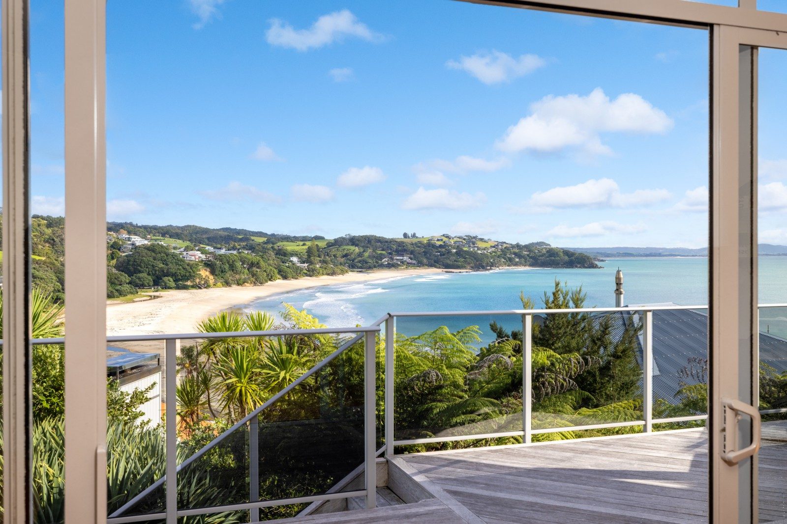 Coastal luxury with panoramic Langs Beach views — slide 2