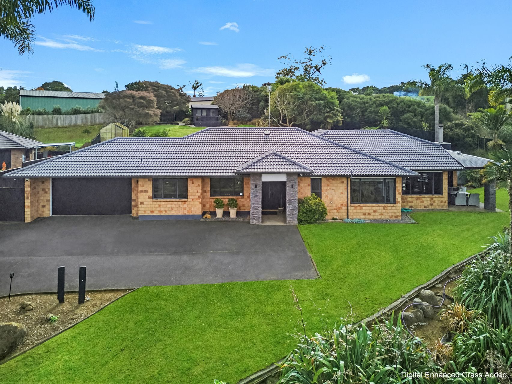 Resort-Style Family Living in Waiuku — slide 1