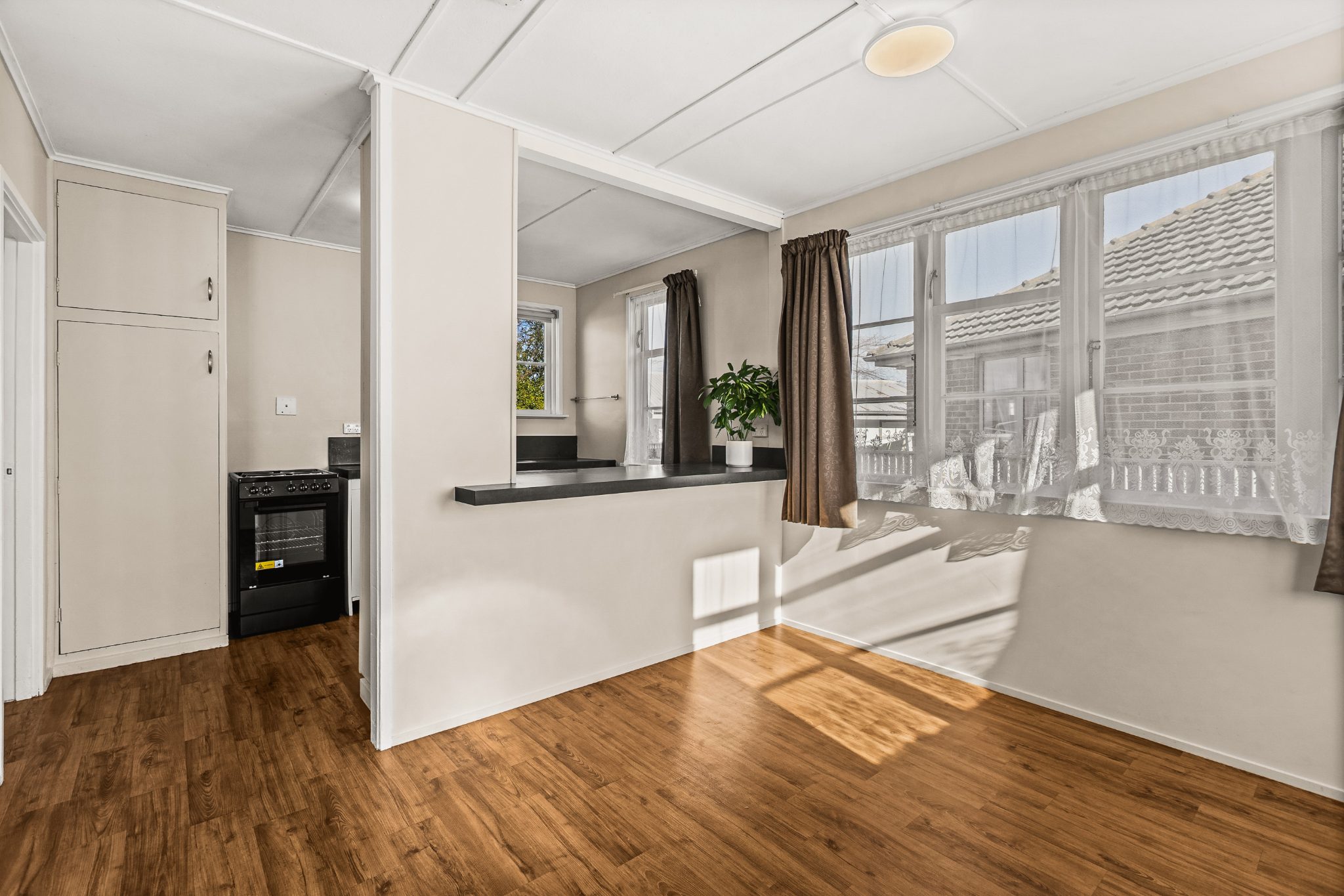 Sunny Start With Spacious Garaging — slide 2