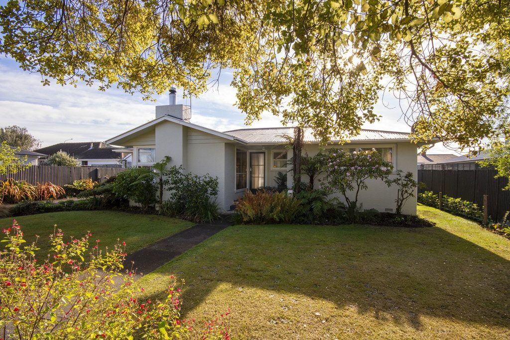 Solid 1960s Charm in a Sought-After Location — slide 2