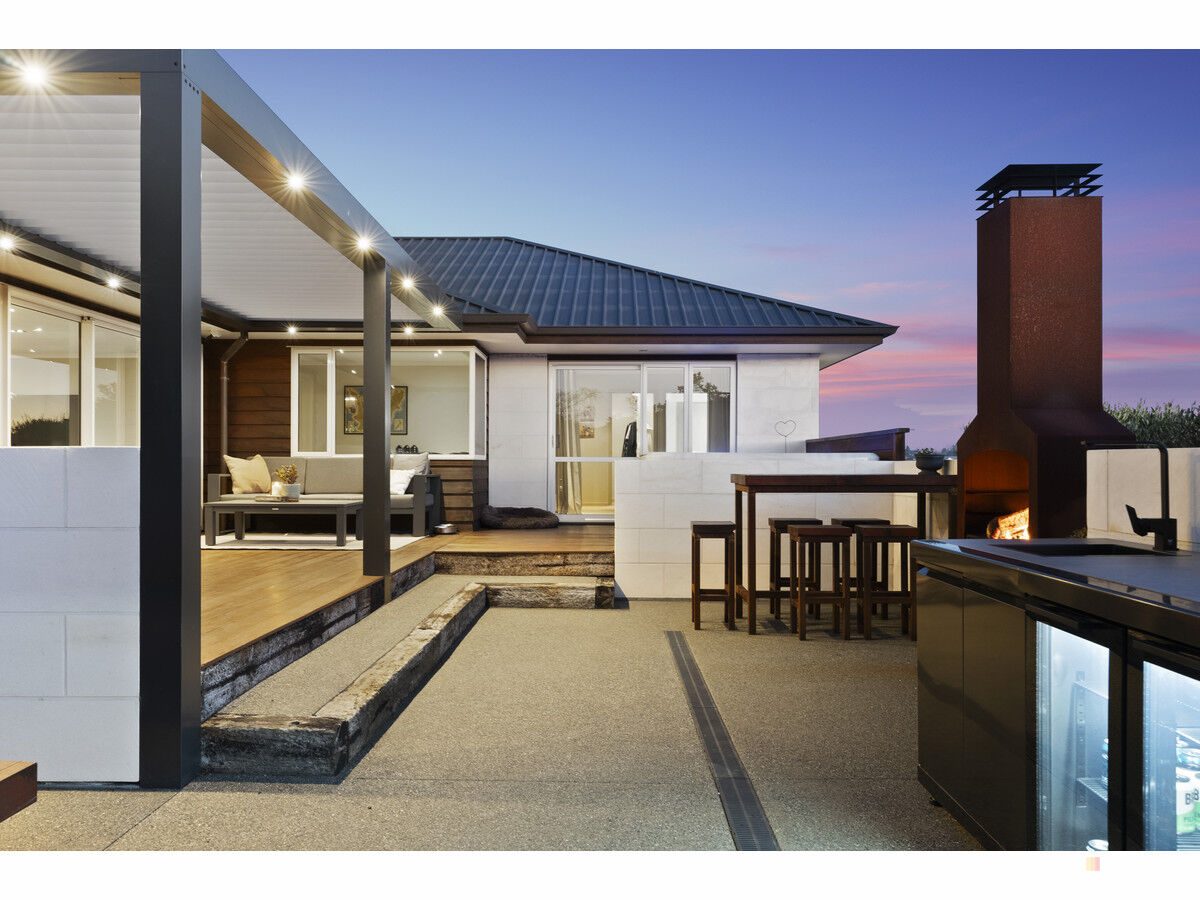Four Bedrooms, Four Cars, and a Backyard That Does — slide 1