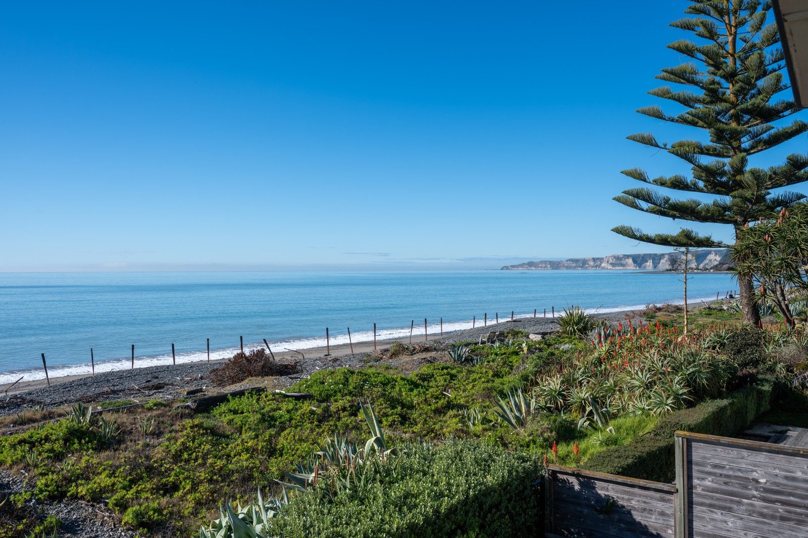 Effortless Beachfront Living with Space to Spare — slide 18