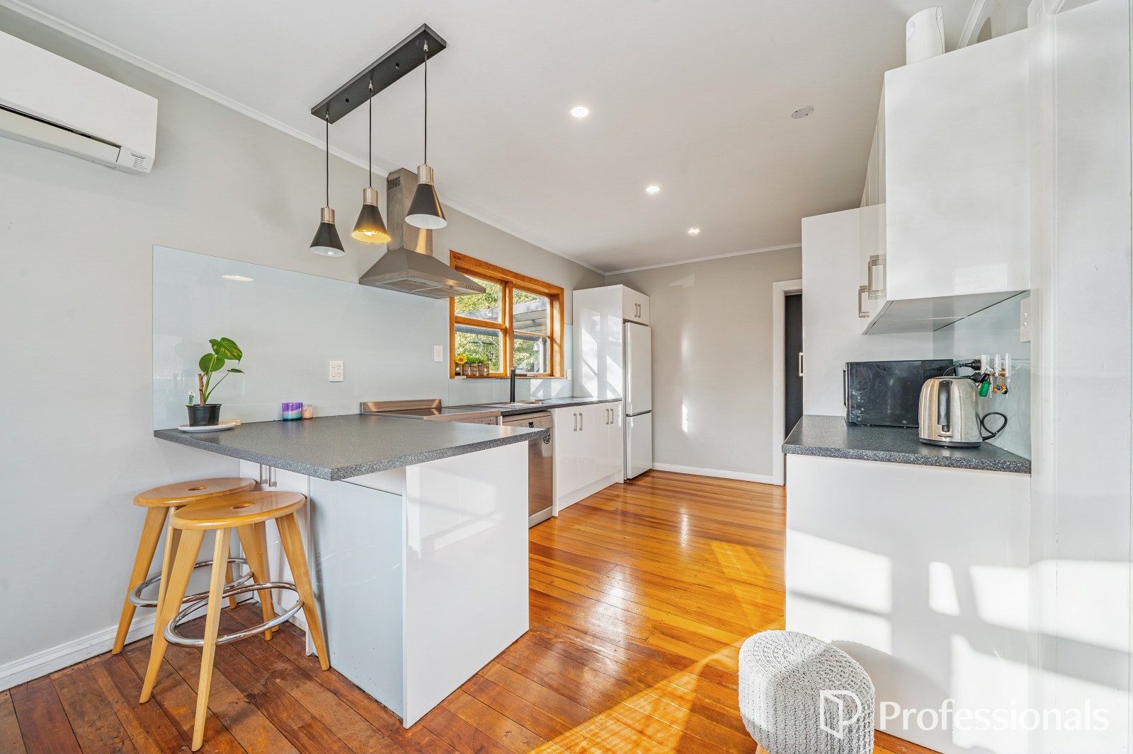 Three Bedrooms, Sleepout & Double Garaging — slide 2