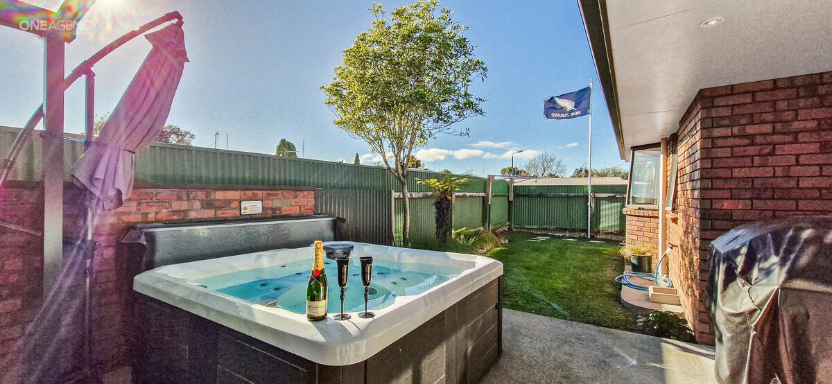 Modern, Brick Home Close to Town — slide 2
