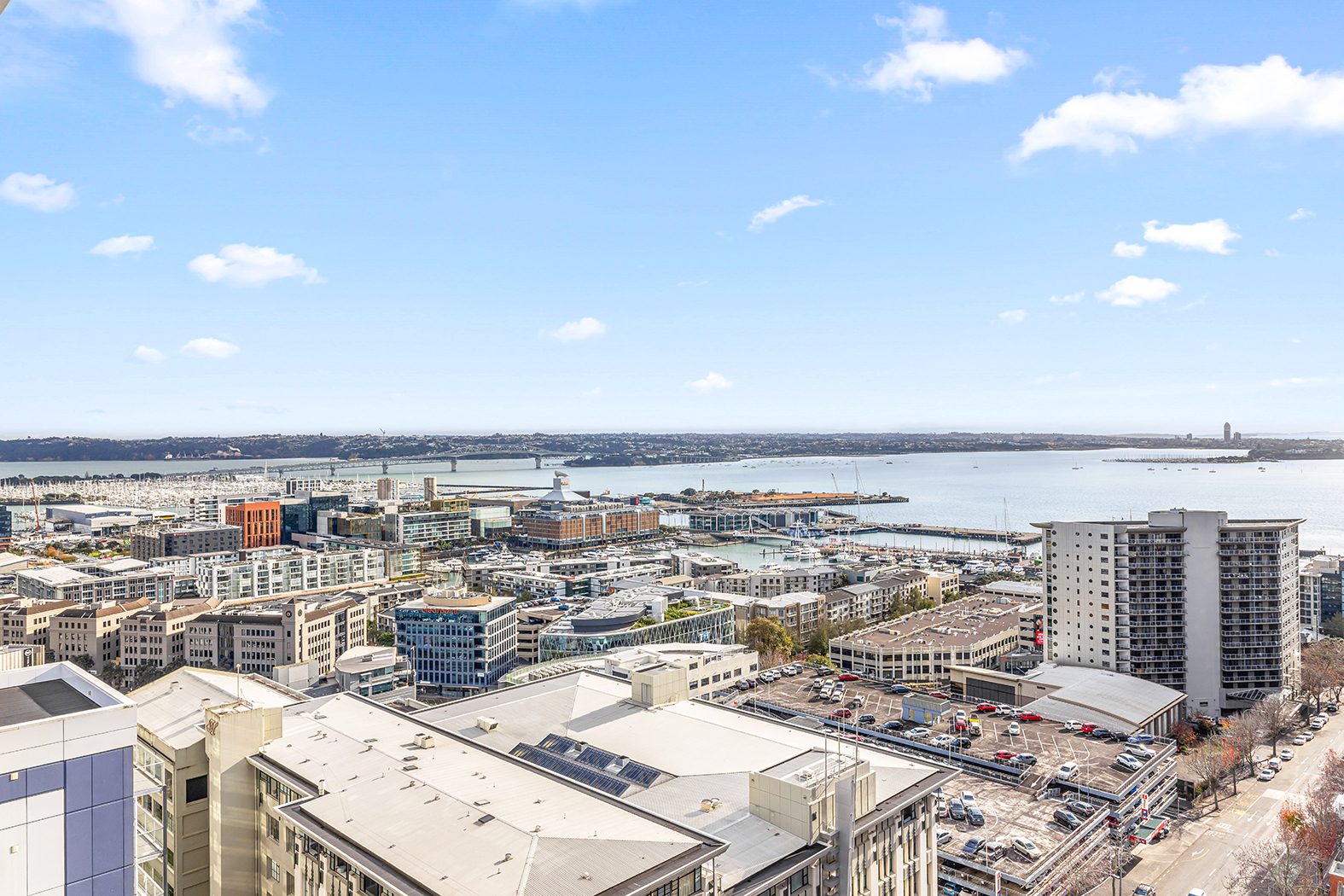 Elevated City Living with Harbour Views — slide 2