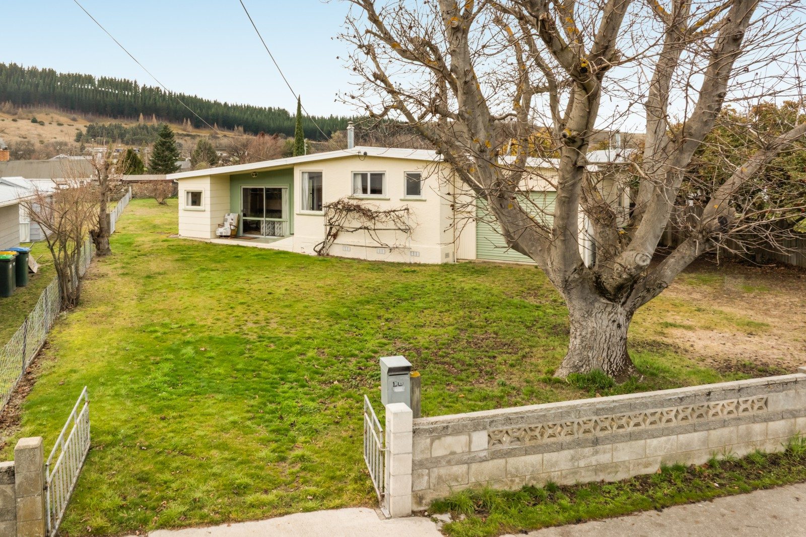 Quintessential Kiwi Bach on a Quarter-Acre Dream — slide 1