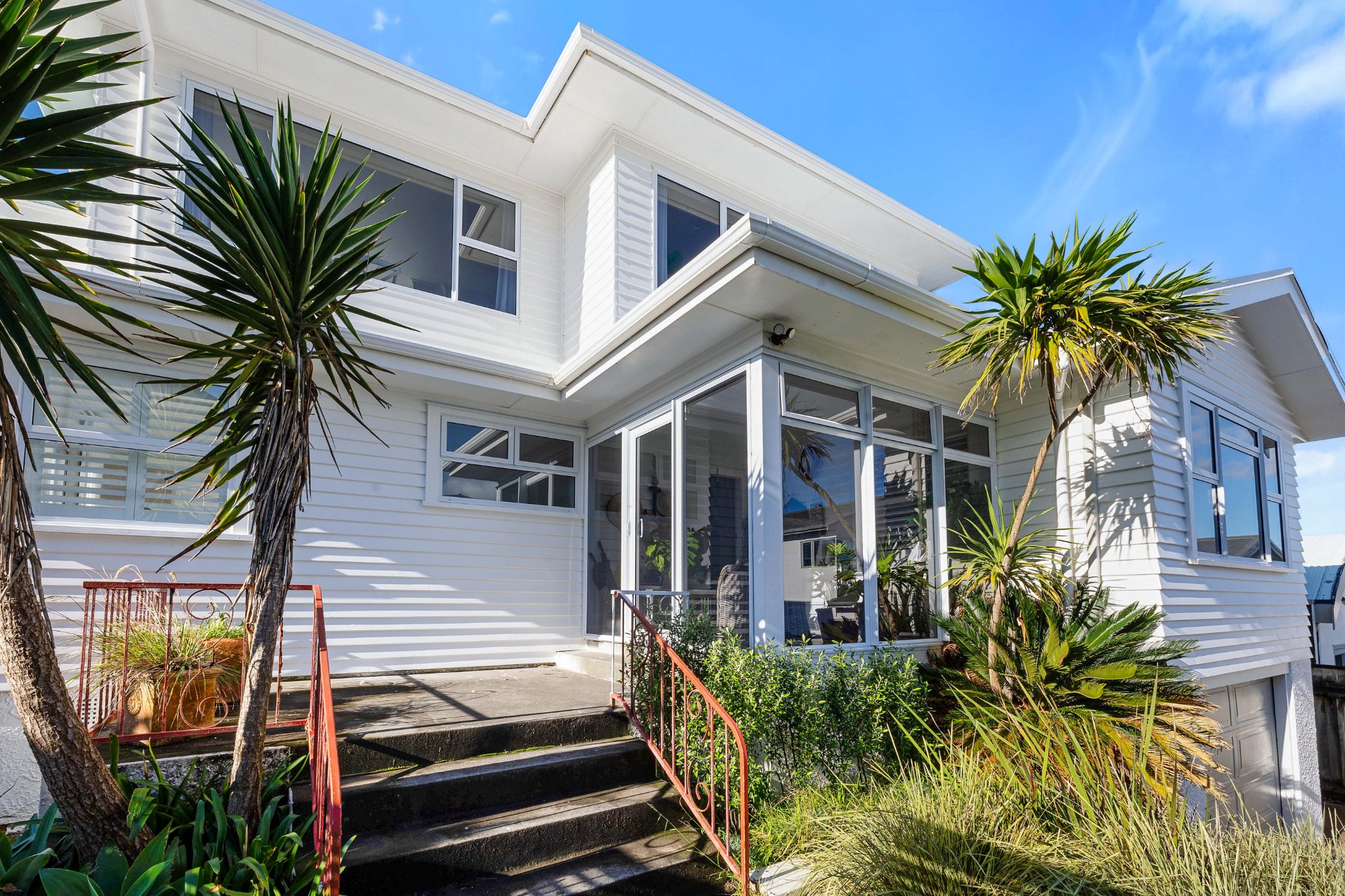 CONTEMPORARY COASTAL LUXURY, ELEVATED WITH VIEWS — slide 2