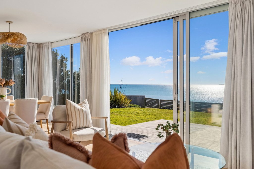 LUXURY BEACHFRONT LIVING — slide 2