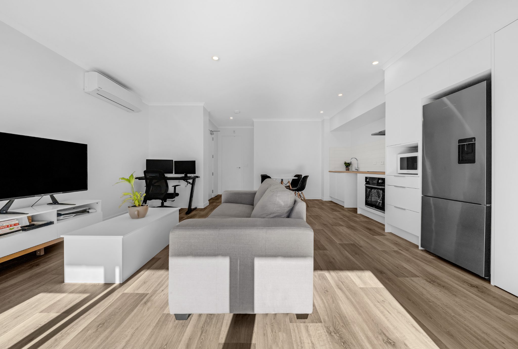 Near-New Top-Floor Living with River Views — slide 2