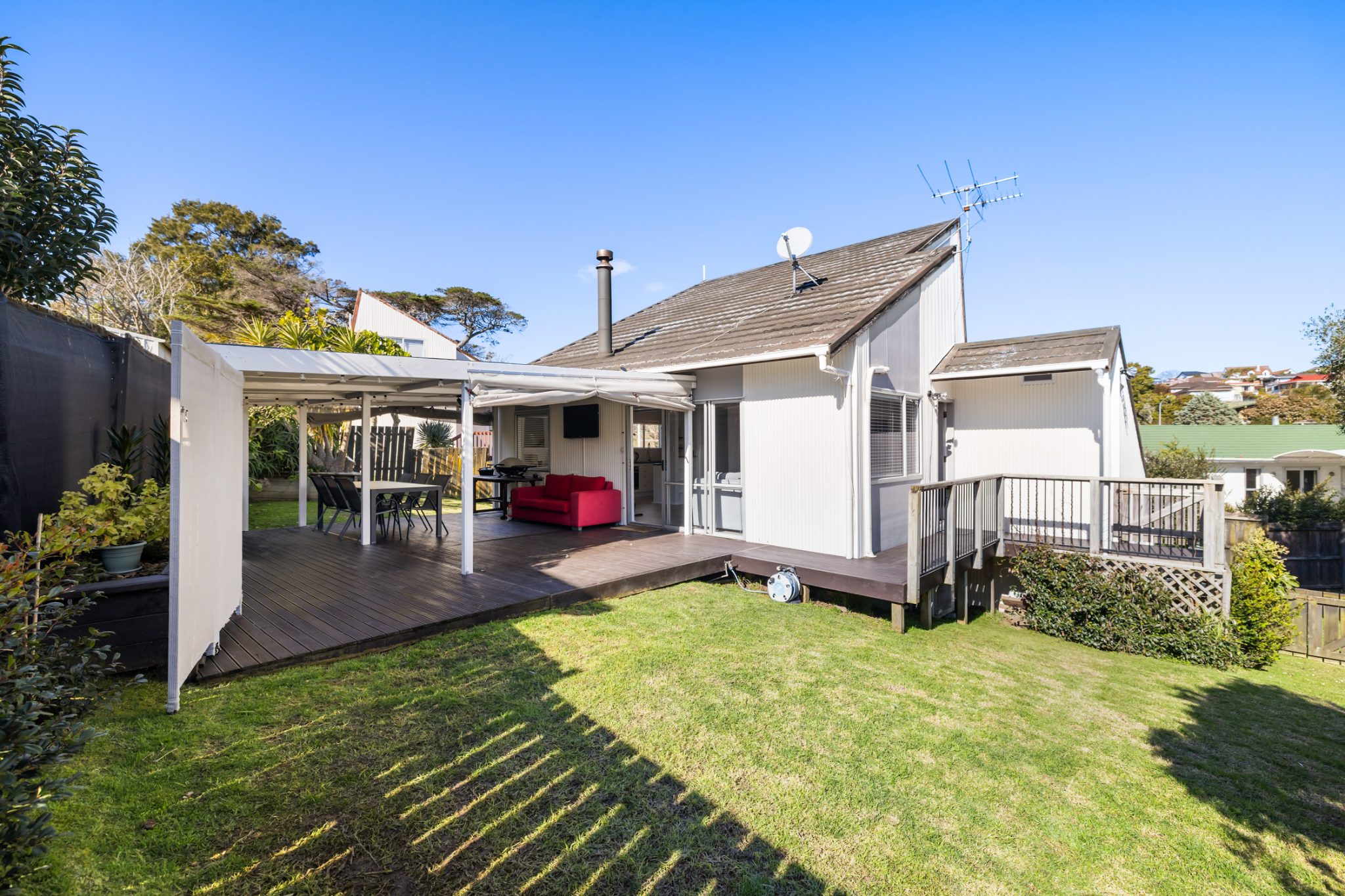 Modernised Living with a Deck to Love — slide 1