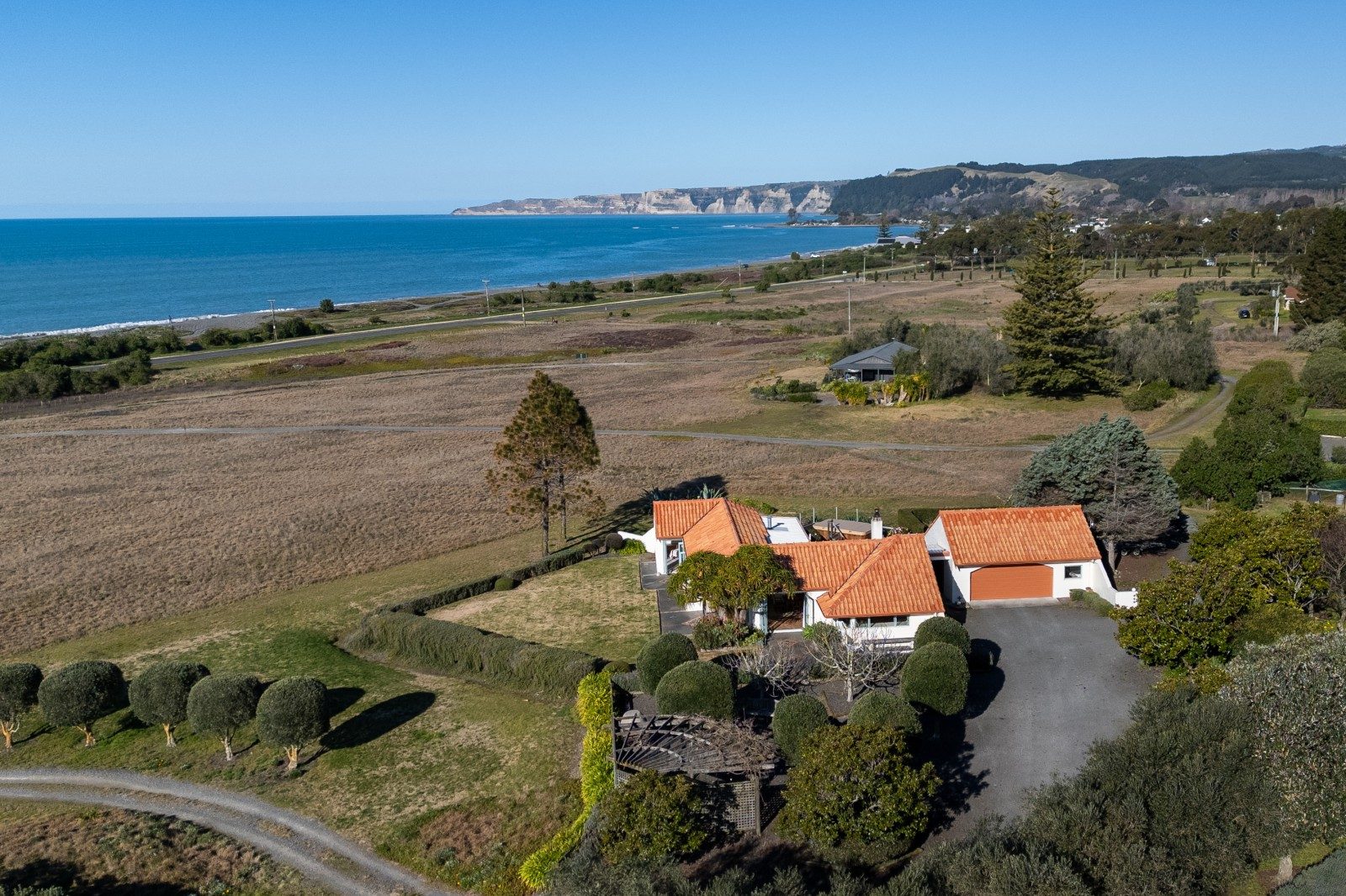 Your coastal oasis with income — slide 1