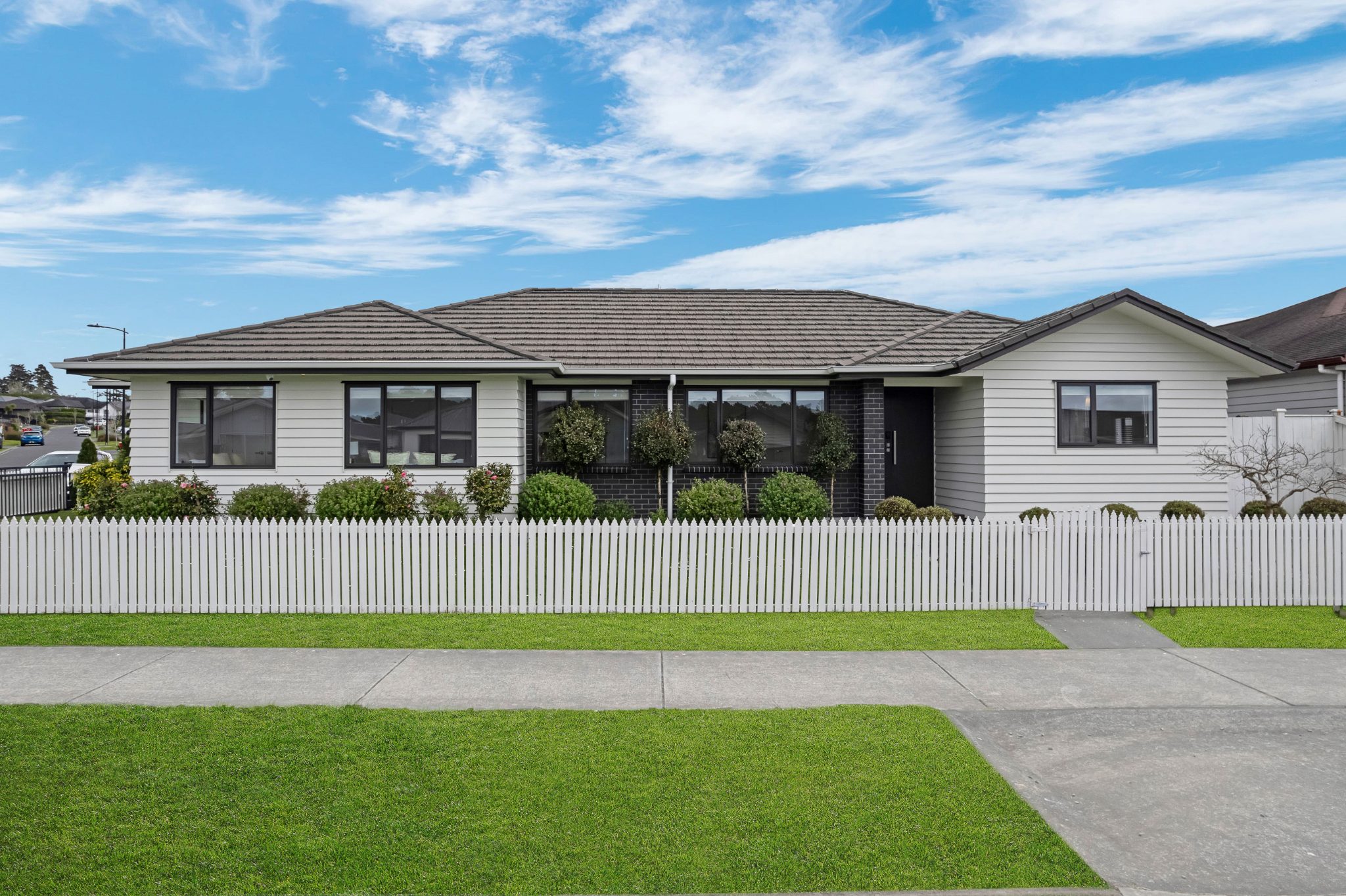 Sun-Drenched Corner Home with Dual Street Frontage — slide 2