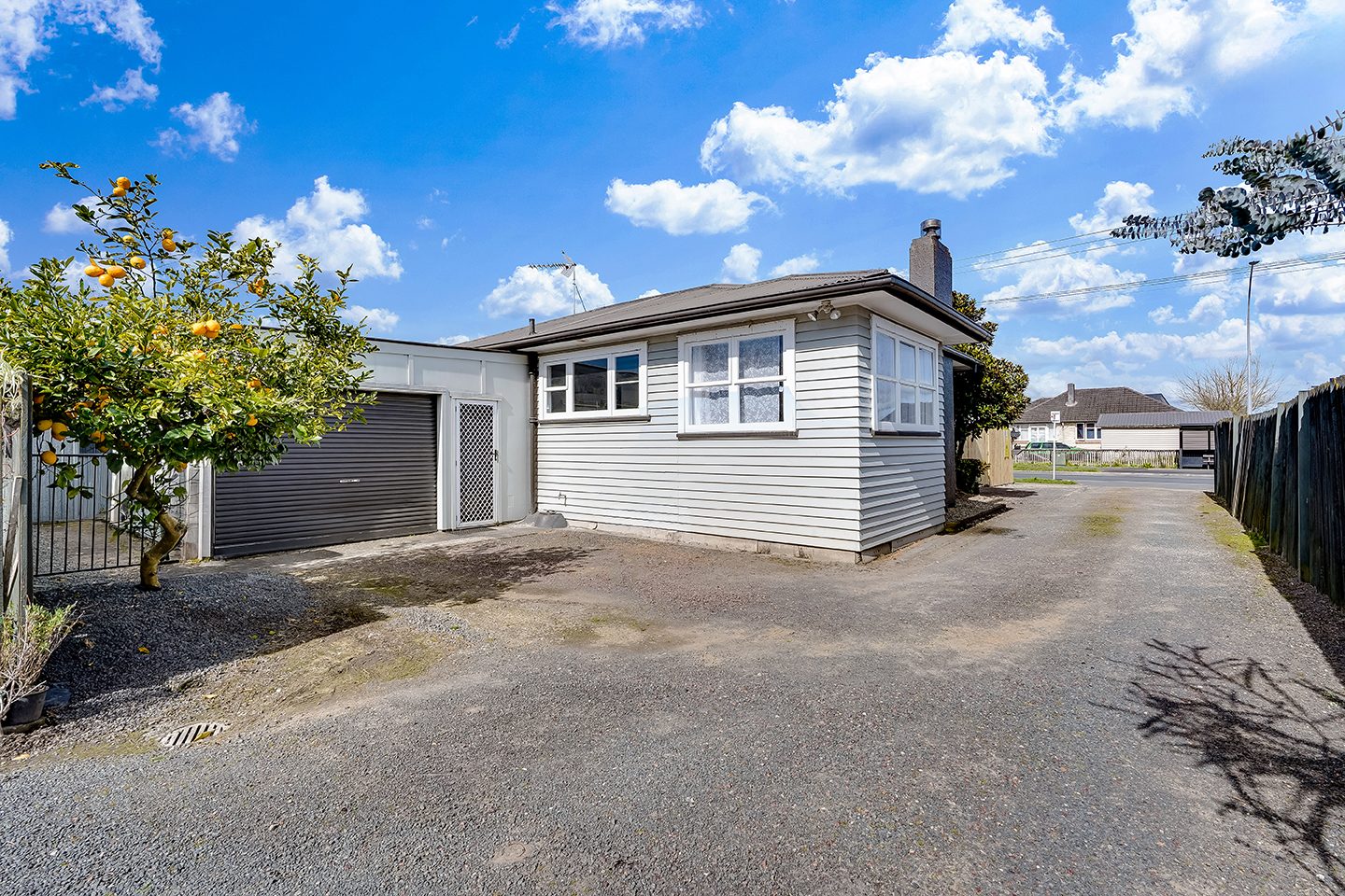 Fully Fenced, Sun-Drenched & Practical Living! — slide 1