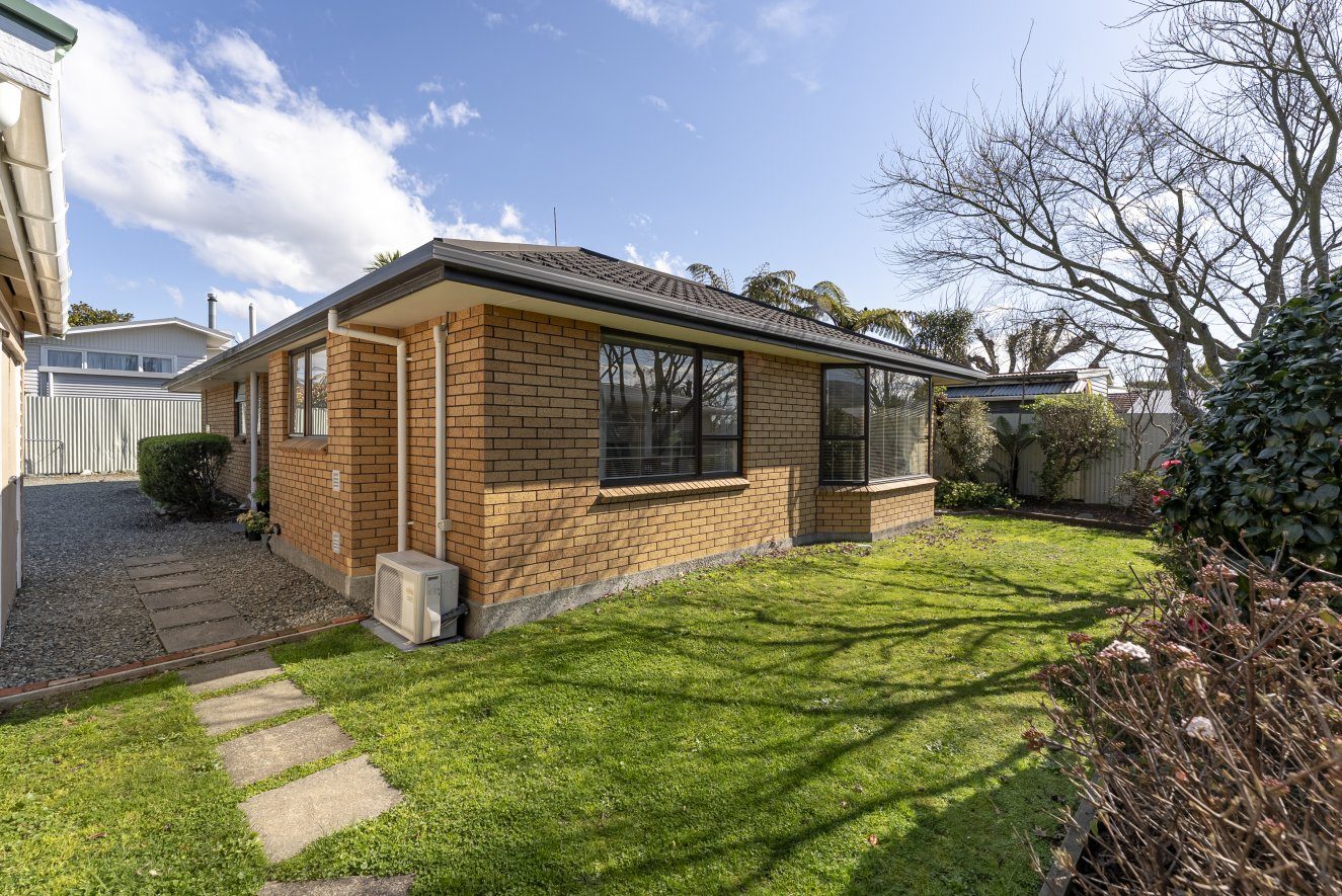 Low Maintenance Three Bedroom Brick Beauty — slide 17