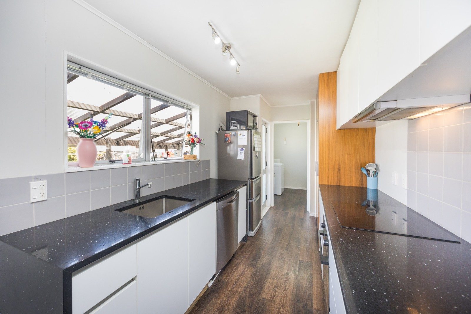 Sunny, modern living on a fully fenced section — slide 2