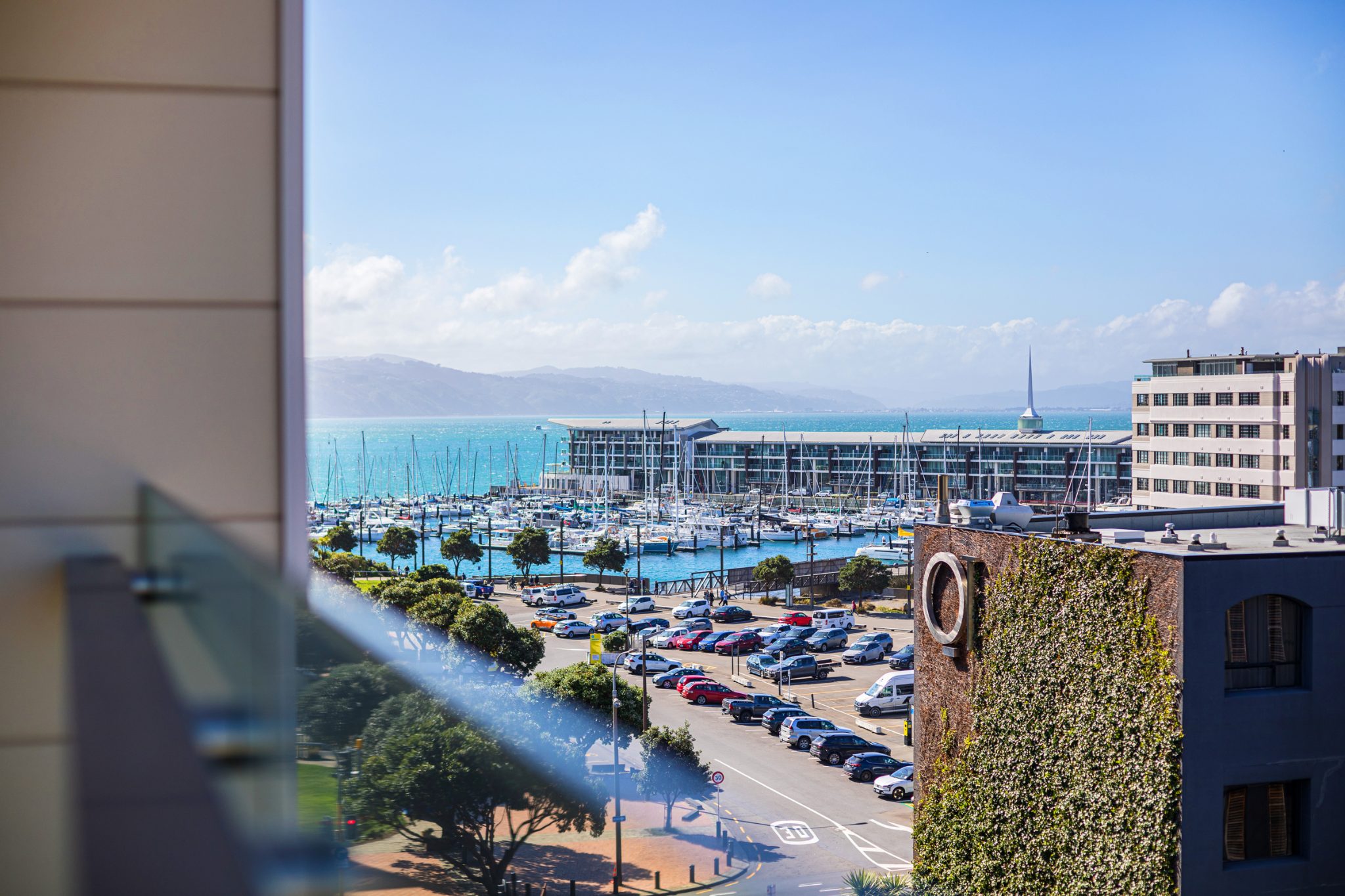LIGHT-FILLED APARTMENT WITH SEA & CITY VIEWS — slide 2
