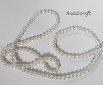 Listing 2 of 2 for A STRAND OF WHITE 3mm SHELL PEARLS