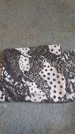 Listing 1 of 1 for BLACK AND WHITE ORGANZA LIKE FABRIC