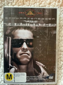 Listing 8 of 20 for “Arnold Schwarzenegger Bulk Lot.”