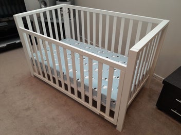 Listing 2 of 4 for Baby cot and mattress.
