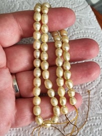 Listing 2 of 3 for Pearl strand - dyed lemon