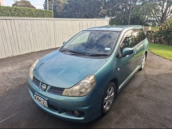 Nissan Wingroad 2006 photo 2